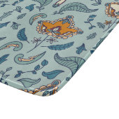 Ornate floral pattern on a pale blue background カッティングボード (角)