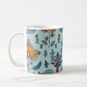 Ornate floral pattern on a pale blue background コーヒーマグカップ (左)