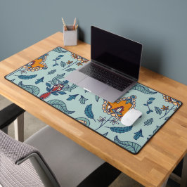 Ornate floral pattern on a pale blue background デスクマット