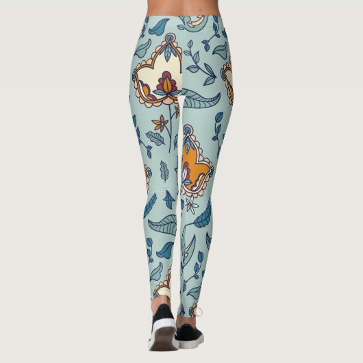 Ornate floral pattern on a pale blue background レギンス (裏面)