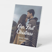 Our first Christmas couple photo name white gray