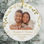 Our First Christmas Engaged Gold Foliage Photo セラミックオーナメント<br><div class="desc">This elegant Engagement Christmas Ornament is decorated with gold foliage on a white background.
Easily customizable with your photo,  names,  and year.
Original Watercolor © Michele Davies.</div>