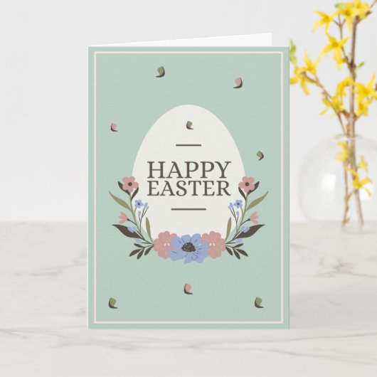 Pale green background with a white egg and flowers カード (黄色い花)