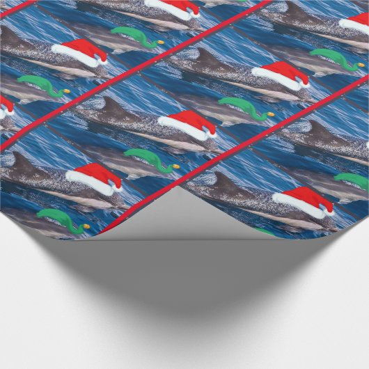 papeを包むお母さんおよびベビーのイルカのサンタのクリスマス ラッピングペーパー (角)