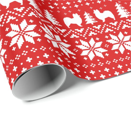 Papillonはクリスマスのセーターパターン赤のシルエットを描きます ラッピングペーパー (ロールコーナー)