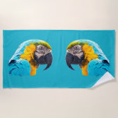Parrot portrait on a turquoise background ビーチタオル (正面)
