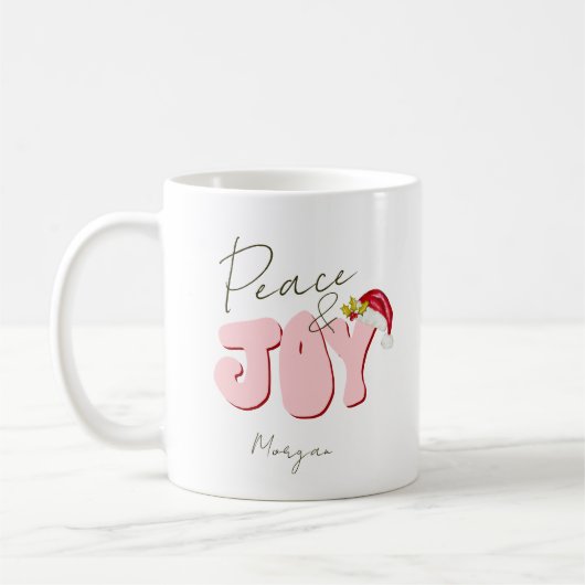 Peace Joyクリスマスピンク赤フェスティバル追加の名前 コーヒーマグカップ (左)