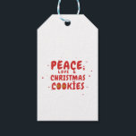 Peace, Love, and Christmas Cookie ギフトタグ<br><div class="desc">この居心地の良いデザインは、陽気で丸いフォントと可愛いクッキーとハートのアイコンで人生に休日の喜びを与え、暖かさと家族の精神を具現化する。ベーキング愛好家や季節の楽しみを大切にする人に最適シンプルな、このデザインはフェスティバルの瞬間を思い出す楽しむお気に入り！</div>
