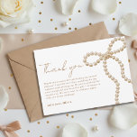 Pearl Bow Bridal Shower She's Tying the Knot サンキューカード<br><div class="desc">Express your heartfelt gratitude in style with this Pearl Bow “She’s Tying the Knot” bridal shower thank you card, designed with a delicate bow motif and elegant script for a soft, romantic aesthetic. Perfect for thanking guests after a bridal shower, this design complements coquette, feminine, and modern bridal themes beautifully....</div>