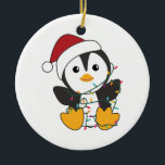 Penguin Christmas Snow Winter Animals Penguins Adu セラミックオーナメント<br><div class="desc">The penguin for Christmas with fairy lights. Funny animals with gifts and snow for the holidays. Also funny for Christmas in July. Penguins are cute animals and perfect for Christmas.</div>