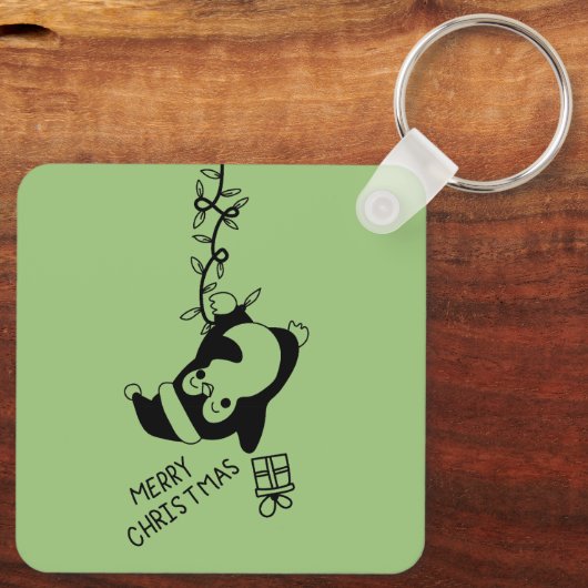 Penguine distributing christmas gifts キーホルダー (裏面)