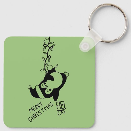 Penguine distributing christmas gifts キーホルダー (裏面)