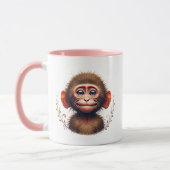 Petit singe drôle de grimace. マグカップ (左)
