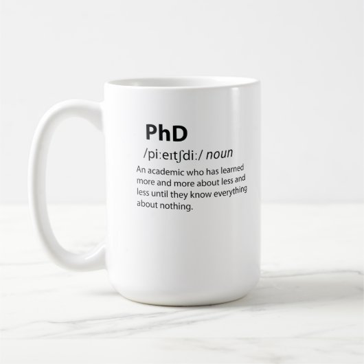PhDディクおもしろいショナリ定義 コーヒーマグカップ (左)