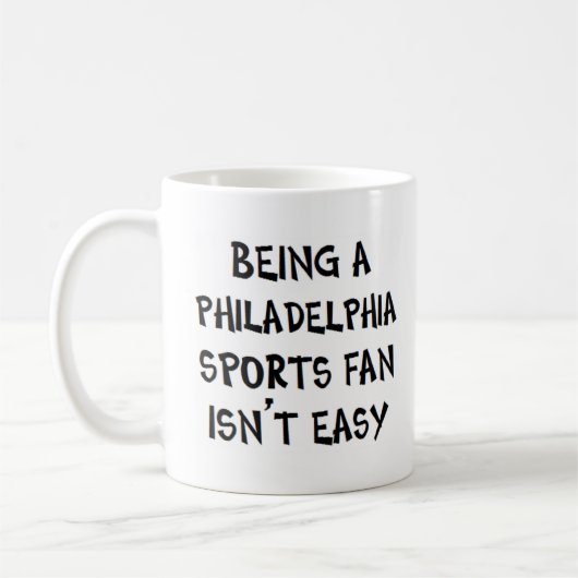 philadelphia sports fan, being コーヒーマグカップ (左)