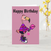 Pickleballの漫画を遊んでいるおもしろいなピンクのフラミンゴ カード (黄色い花)