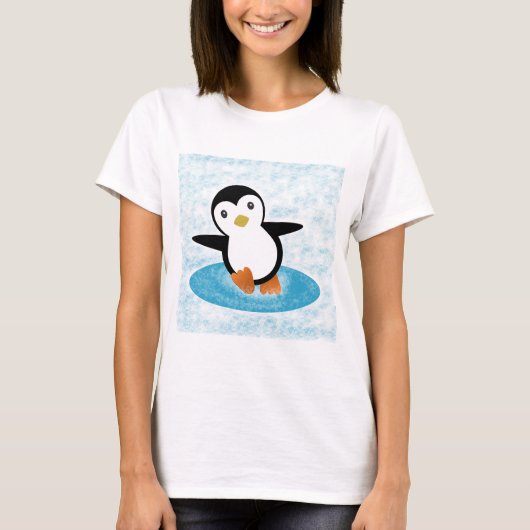 Pingüino patinando en la nieve tシャツ (正面)
