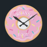 Pink Donut with Sprinkles Bedroom or Playroom ラウンド壁時計<br><div class="desc">This design features our cute pink donut with sprinkles, in a pink, purple and mint green color scheme. Click the customize button if you would like to move/scale the images and further modify the text! Variations of this design, additional colors, as well as coordinating products are available in our shop,...</div>