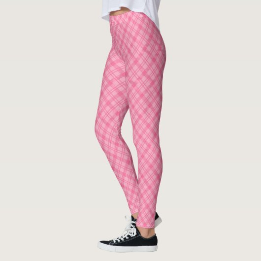 Pink plaid leggings displayed front view, worn  レギンス (左)