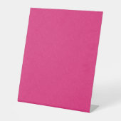 Pink textured surface with subtle swirling pattern 台座サイン (正面)
