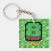 Pixelated Gamer Green Building Level Up 8 キーホルダー (正面)