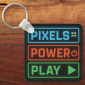 Pixels Power Play Keychain – Retro Gamer Accessory キーホルダー (正面)