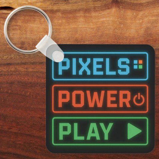 Pixels Power Play Keychain – Retro Gamer Accessory キーホルダー (正面)