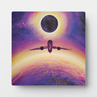 Plane in flight city and eclipse フォトプラーク