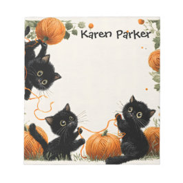  Playful Black Cat with Pumpkin-Inspired Orange ノートパッド