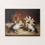 Playing Cards | Carl Reichert ジグソーパズル<br><div class="desc">Playing Cards | Carl Reichert’s Playing Cards is a whimsical and delightful painting featuring three playful cats gathered around a table, seemingly engaged in an intense card game. The cats’ expressive faces and dynamic poses add humor and charm, while the finely detailed setting enhances the scene’s cozy and lighthearted atmosphere....</div>