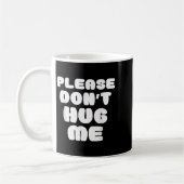Please Don't Hug Me Funny  コーヒーマグカップ (左)