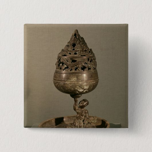 「poシャン語lu'の形をしたCenser 缶バッジ (正面)