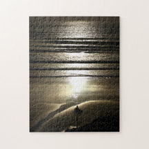 Polzeathのジグソーパズルの日没のサーファー