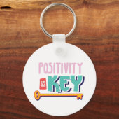 positivity is the key design キーホルダー (正面)
