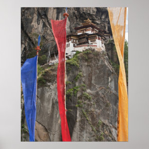 Prayer flags hang near Taktshang ポスター