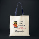 Pre-K 2023 Graduate Owl Funny Graduation Class トートバッグ<br><div class="desc">A cute tote bag for a pre-k grad featuring an illustration of an orange and yellow owl posing on books with it's pencil and wearing a grad cap. "I'm a Pre-K Graduate!" Great for kids graduating from pre-kindergarten education and ready to advance to first grade schooling</div>
