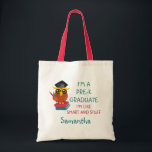Pre-K Graduate Cute 2023 Owl Funny Graduation Name トートバッグ<br><div class="desc">A cute tote bag for a pre-k grad featuring an illustration of an orange and yellow owl posing on books with it's pencil and wearing a grad cap. "I'm a Pre-K Graduate!" Great for kids graduating from pre-kindergarten education and ready to advance to first grade schooling</div>