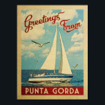 Punta Gorda Sailboat Vintage Travel Florida ポスター<br><div class="desc">This Greetings From Punta Gorda Florida vintage travel nautical design features a boat sailing on the water with seagulls and a blue sky filled with gorgeous puffy white clouds.</div>