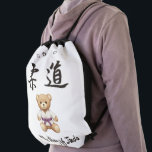 【Purple】For all judo lovers, young and old. ナップサック<br><div class="desc">For all judo lovers, young and old. This charming "Judo Bear" design celebrates the spirit of Japanese martial arts, combining the strength and gentleness of judo with a touch of cuteness. Featuring a black belt bear in a classic judogi, this design is fully customizable—you can add your name, dojo, or...</div>