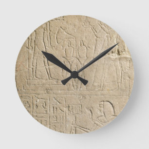 Ramesses IIの提供の香をに描写するStelaこんにちは ラウンド壁時計