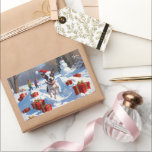 Rat Terrier走 Christmas Hatと雪の中 長方形シール<br><div class="desc">雪の多い冬の走シーンを楽しげに楽しげにラットテリアは、フェスティバルの赤いクリスマスハットを着て。このよくはしゃぐデザインは、休日の暖かさと喜びをキャプチャしながら、品種のアスレティックフレーム、アラート表現、気鋭い個性を強調する。陽気な冬の瞬間はフェスティバルの魅力でいっぱいだ。</div>