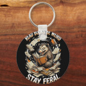 Read books be weird stay feral funny opossum キーホルダー (正面)