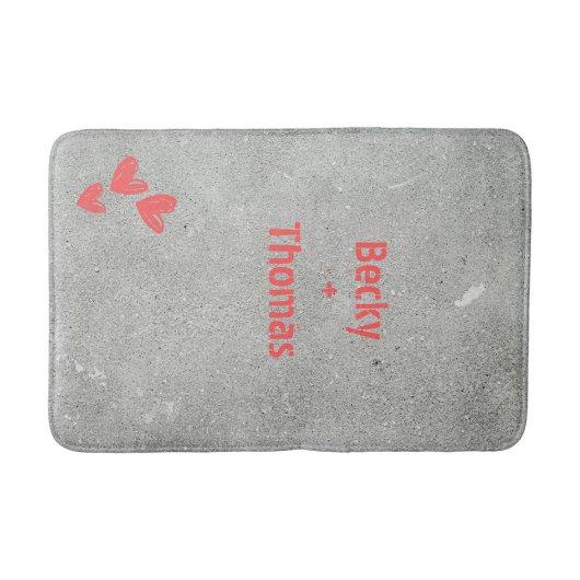 Red graffiti name on gray concrete, your バスマット (正面)