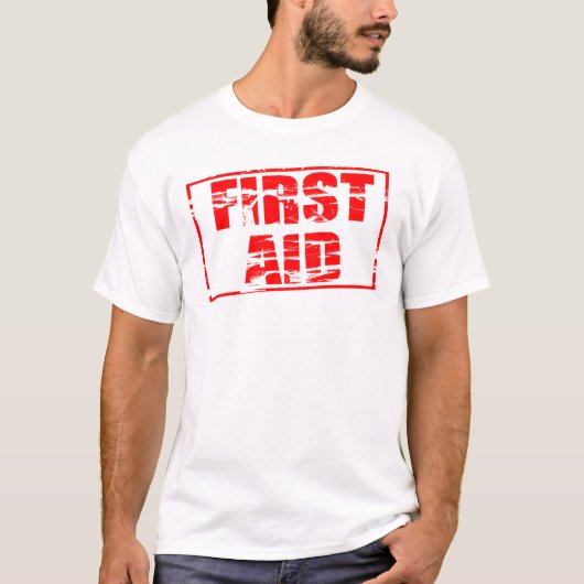 Red rubber stamp effect. First Aid.  Tシャツ (正面)