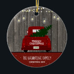 Red Truck and Mason Jar Lights Family Name Holiday セラミックオーナメント<br><div class="desc">Red Truck and Mason Jar Lights Family Name Holiday Ornament - What. a lovely addition to your Christmas tree. Our rustic ornament features a red vintage pick up truck is carrying a freshly cut Christmas tree with mason jar lights twinkling overhead. The background of the ornament is rustic barnwood. Our...</div>