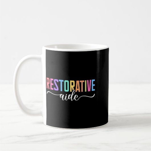 Restorative Aide Designs ユニセックス大人用 ブラック コーヒーマグカップ (左)