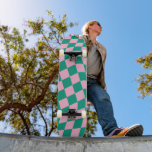 Retro Aesthetic Vibrant Pink Green Checkerboard スケートボード<br><div class="desc">This skateboard features a bold, wavy checkerboard pattern in soft pink and rich green for a playful yet modern look. The curved checker design adds movement and personality while staying graphic and minimal. Designed for riders who love color, retro energy, and statement style, it works equally well as a functional...</div>