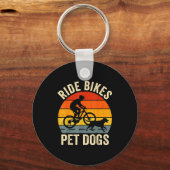 Ride bikes pet dogs funny saying for cycling and キーホルダー (正面)