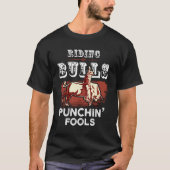 Riding Bulls Punching Fools Funny Bull Rider Rodeo Tシャツ (正面)