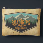 Road Trips & Shenanigans Outdoor Patch Zipper Bag アクセサリーポーチ<br><div class="desc">If you love road trips to National Parks, this zipper bag is for you! This fun road trip design features a National Parks inspired patch with a row of mountains and trees. The wording on this pouch reads "RoadTrips and Shenanigans" in orange. You can customize your bag with your name....</div>